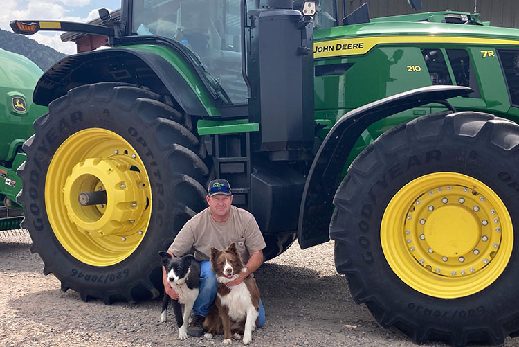 John Etchart with his dogs and tractors, courtesy of John and Sheryl Etchart.