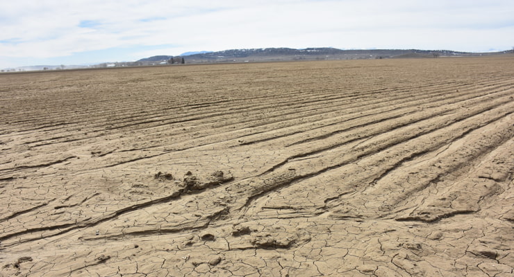 "Evidence of erosion is shown in a tilled field"