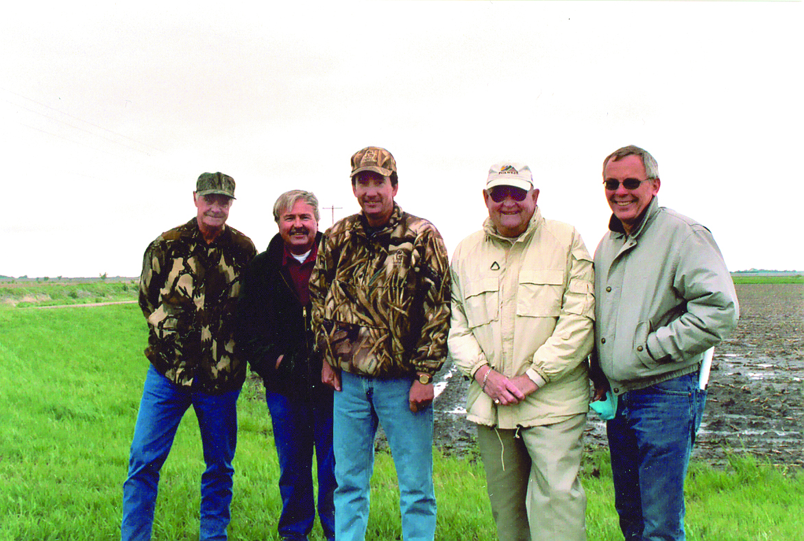 ​​ Landowners Frank Hill, Larry Rouse, Don Cox, and Leo Pavelka worked with NRCS Resource Conservationist Ken Franzen and other partner agencies to help restore the large wetland near Trumbull, Nebraska. Photo taken in 2004 by Joanna Pope, NRCS.