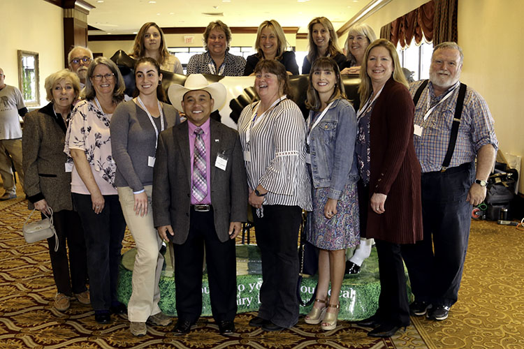 A photo of a group of 14 people, including Nina and Kim, at the March 10, 2020 Rhode Island Women in Agriculture Conference