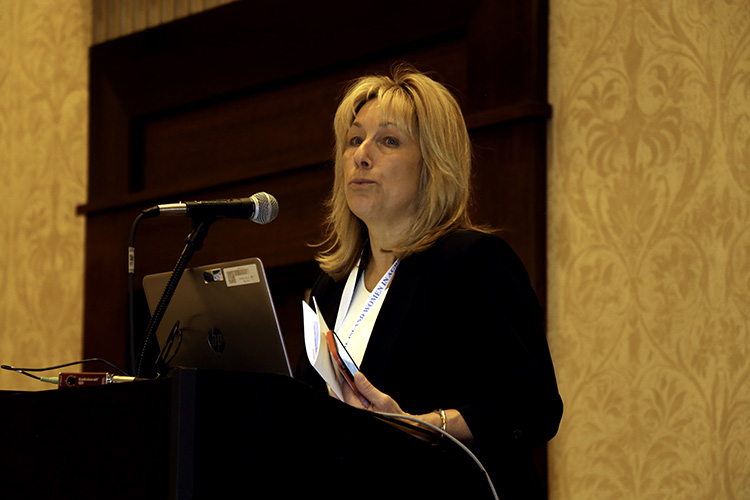 A photo of Kim speaking at the 2020 Rhode Island Women in Agriculture Conference.