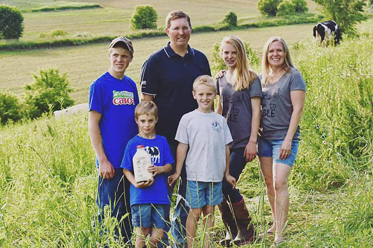 Family photo of Matt and Chrissy Peckham with their four children at Elm Farm