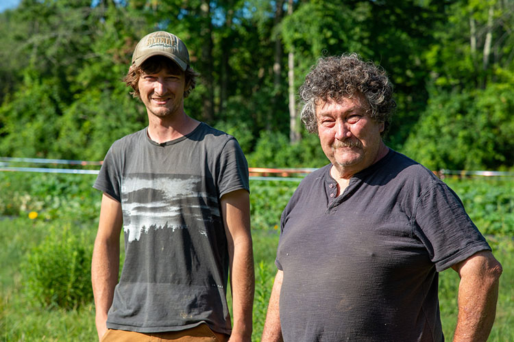 Greg Cox and his son, Avery, on their farm in West Rutland, Vermont.