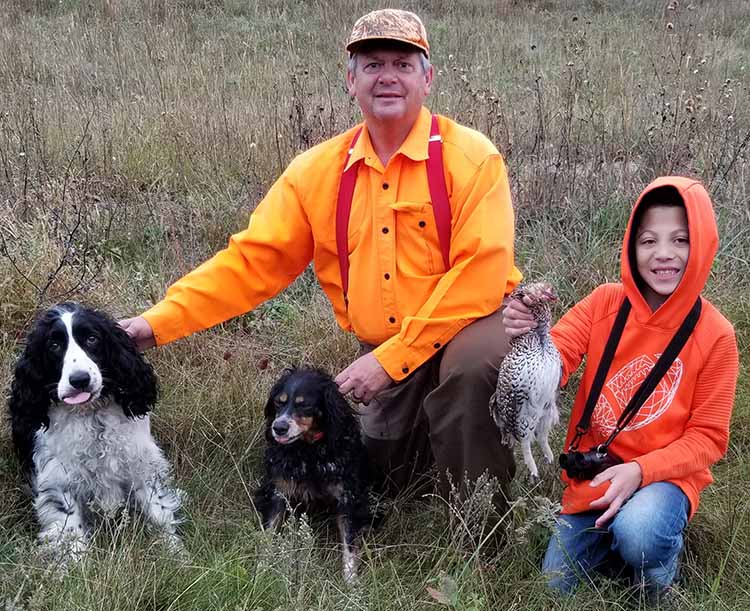 Rich Straight and his grandson Landon enjoy a successful day hunting together. 