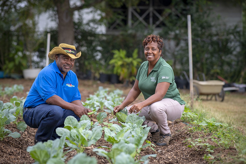 Bobby Wilson with NRCS District Conservationist Shemekia Mosley. Photo taken in 2018 by Preston Keres, USDA.