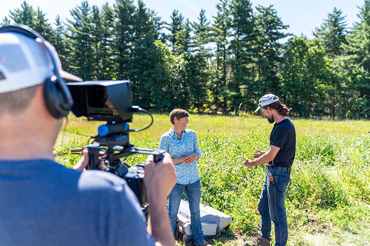 Dan Perkins of Good Earth Farms in DeMotte, Ind., and McLain discuss his regenerative farming practices, including cover crops, for a video project. Photo by Brandon O’Connor, Indiana NRCS.