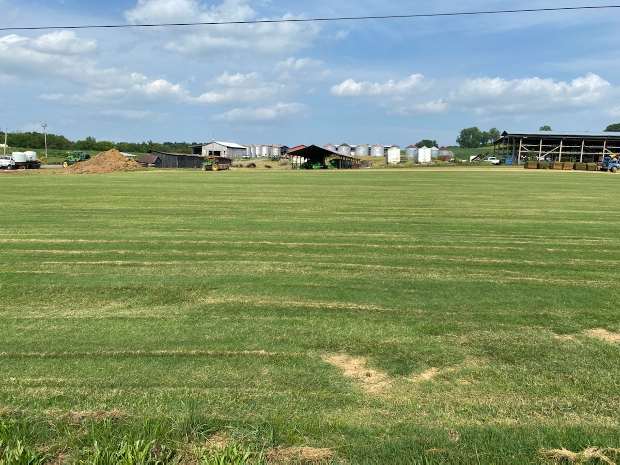 Farm building sitting in horizon