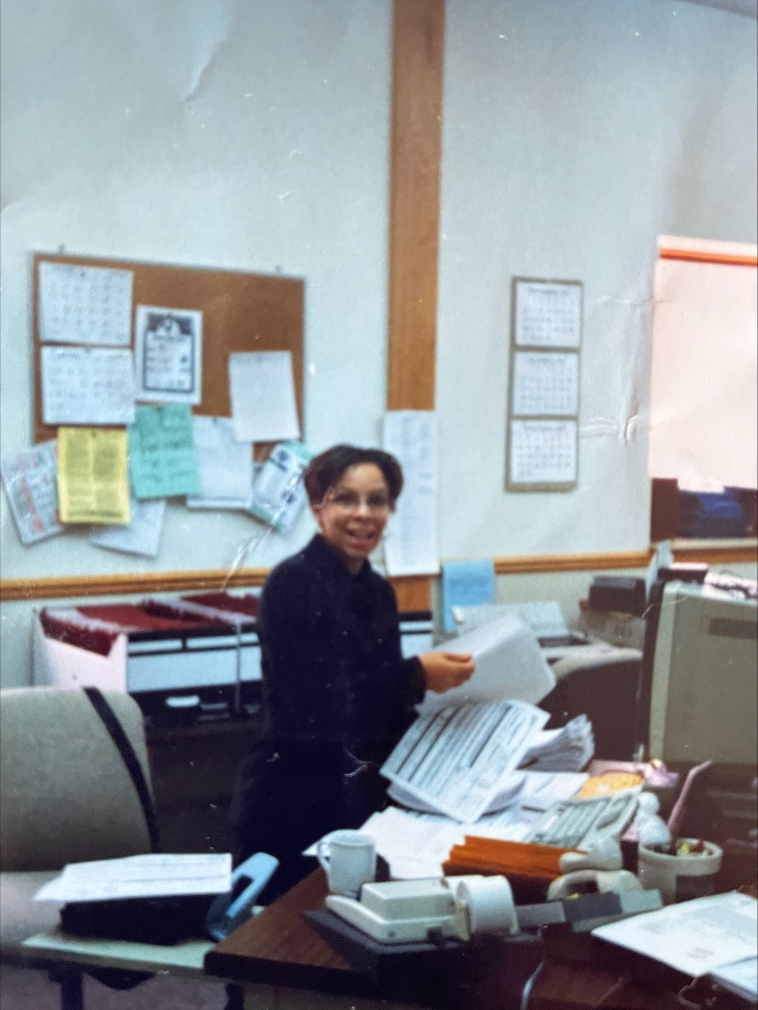 Person sitting at vintage desk