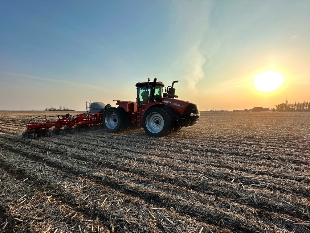 Red tractor in field