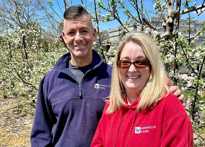 Two people smiling