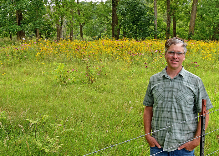Person standing in a field