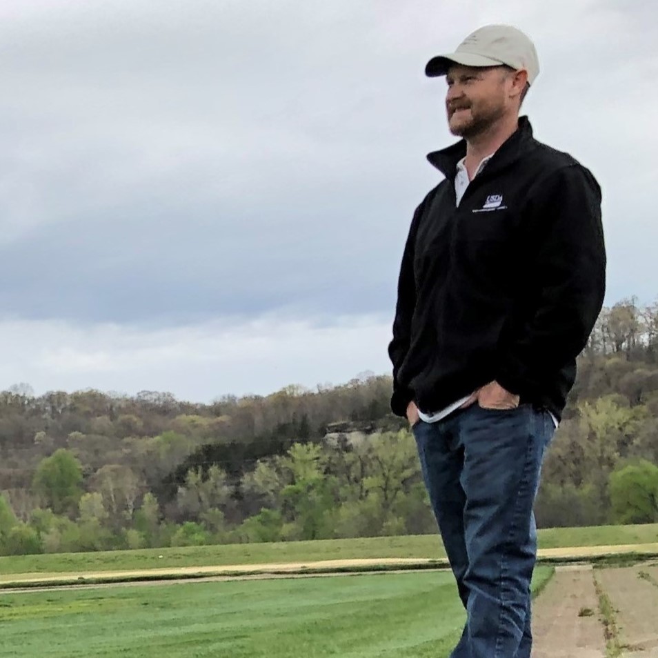 Person standing in a field
