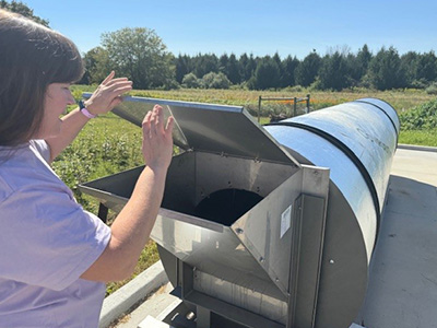 Person added material to compaoster