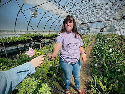 Person in a high tunnel