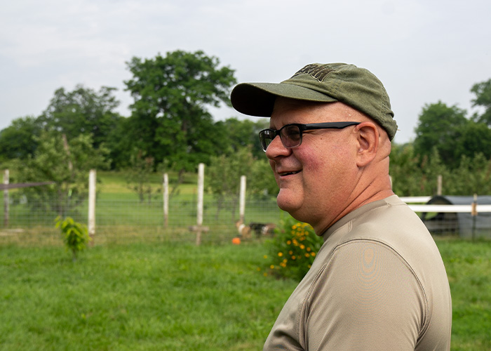Person looking out on to a field