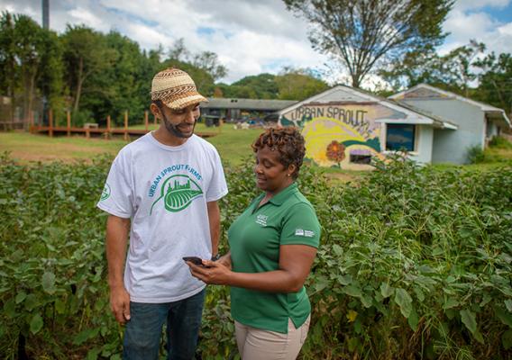 Farmers talking in a field