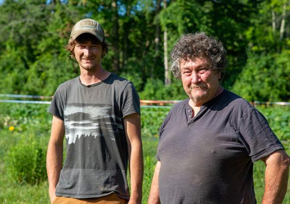 Greg Cox and his son, Avery, on their farm in West Rutland, Vermont.