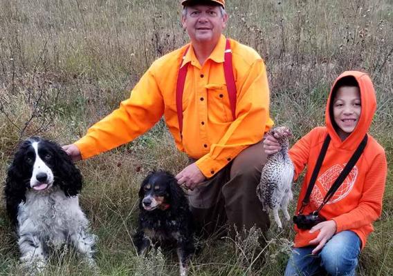 Rich Straight and his grandson Landon enjoy a successful day hunting together. 