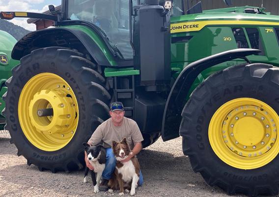 John Etchart with his dogs and tractors, courtesy of John and Sheryl Etchart.