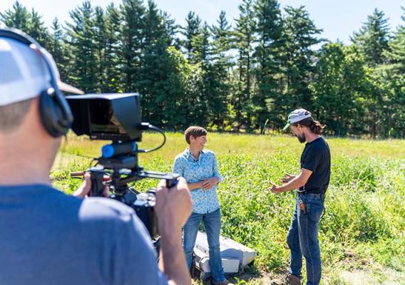 Dan Perkins of Good Earth Farms in DeMotte, Ind., and McLain discuss his regenerative farming practices, including cover crops, for a video project. Photo by Brandon O’Connor, Indiana NRCS.