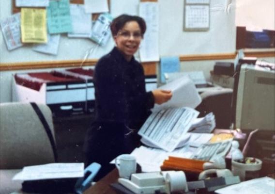 Person sitting at vintage desk