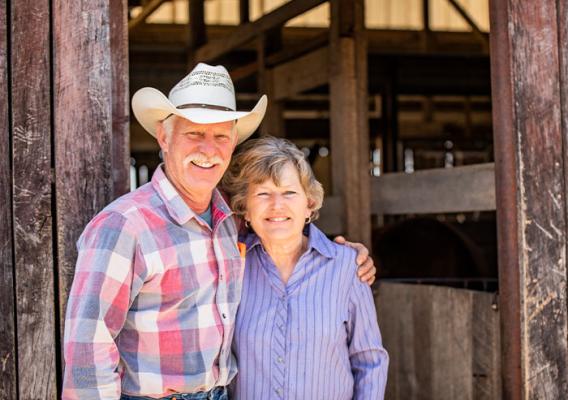 Two people smiling