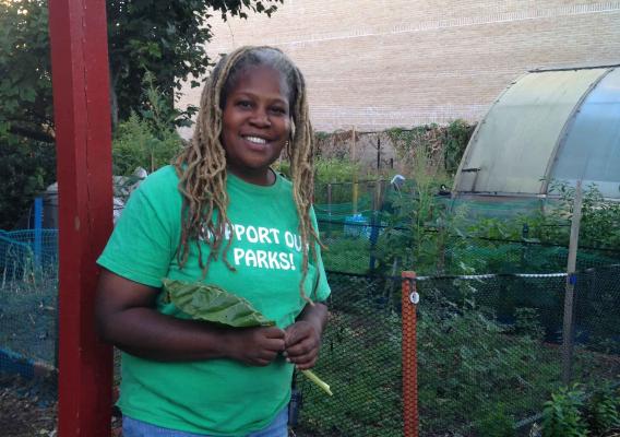 Karen Washington standing in front of her urban farm