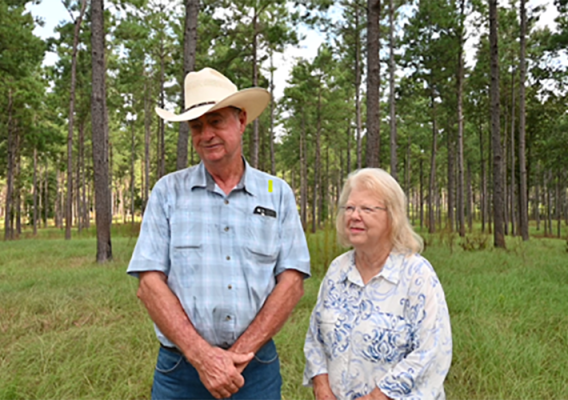 Two people smiling