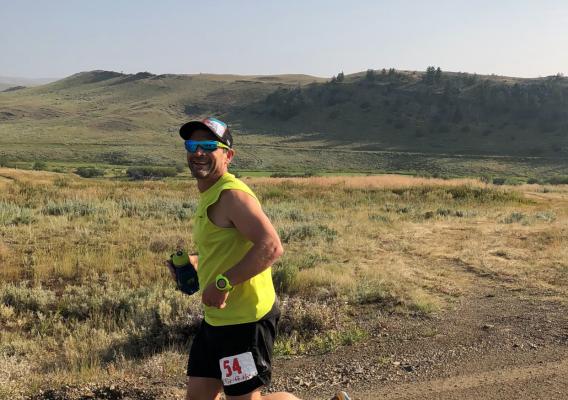 Man running on a ranch