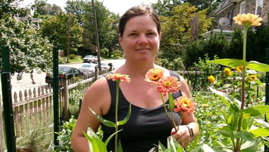 Person standing amongst flowers