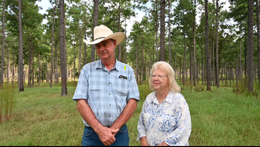 Two people smiling