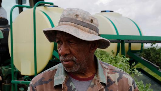 Person with hat staring into the distance